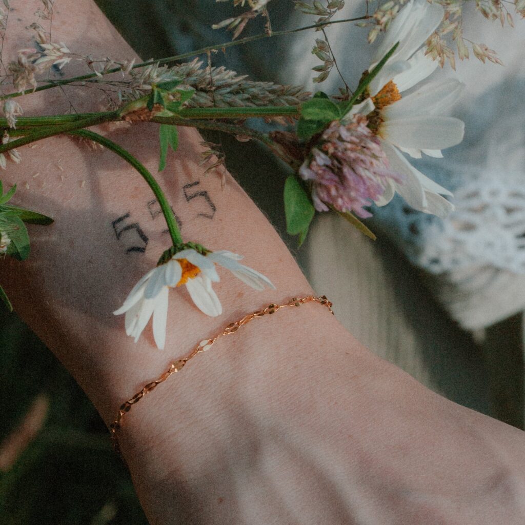 Wave Schakelarmband | Goud